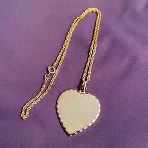 gold tone heart pendant necklace with 18” braided chain